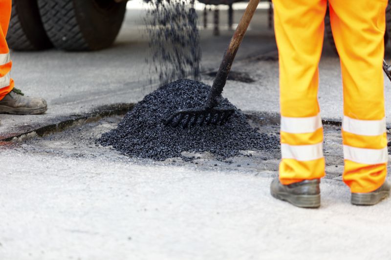 Local Parking Lot Asphalting pros at work